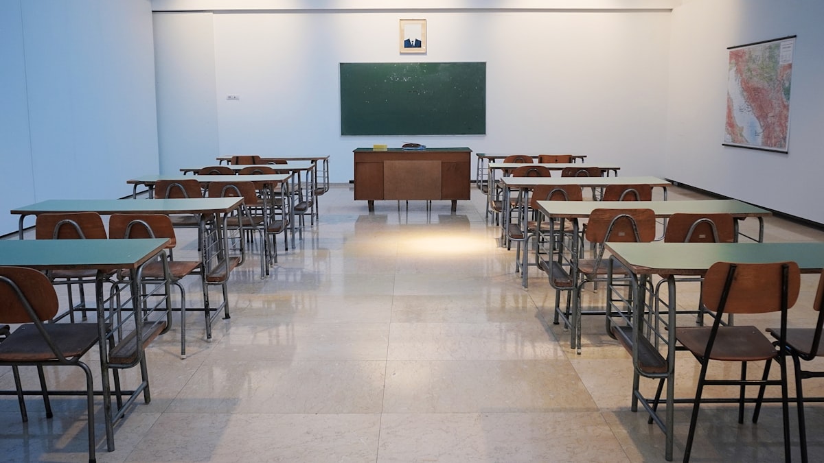 A classic classroom setting representing the educational mission of the early IPhO