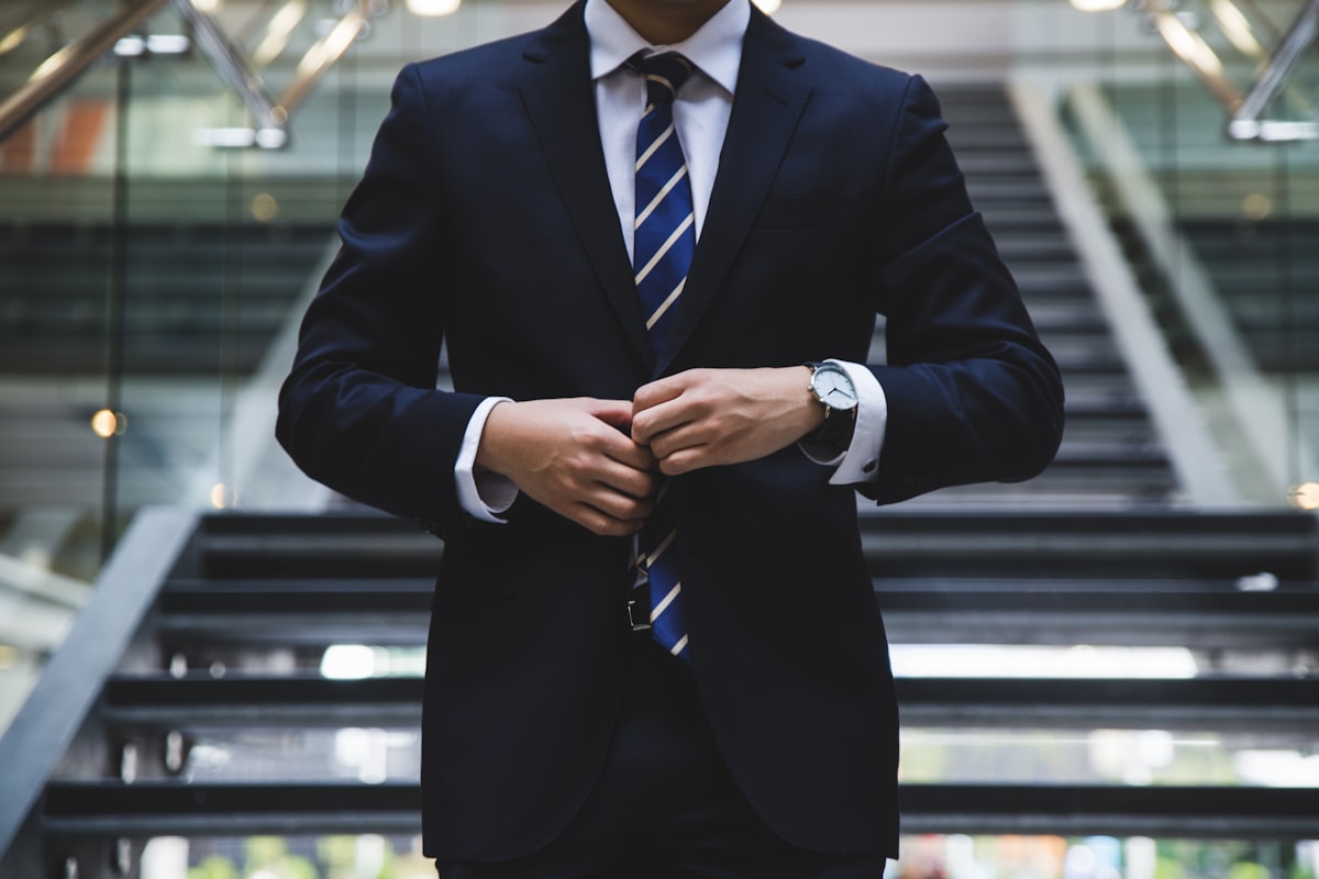 A professional in a business environment, demonstrating the transferable skills developed through BPhO preparation