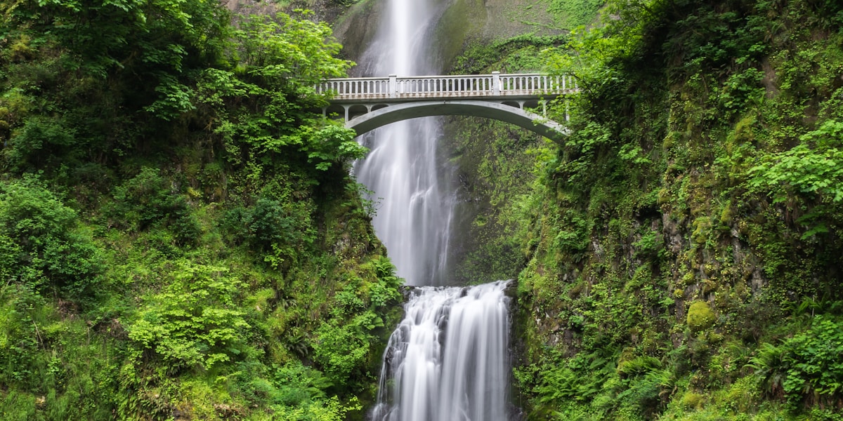 A stone bridge over a waterfall