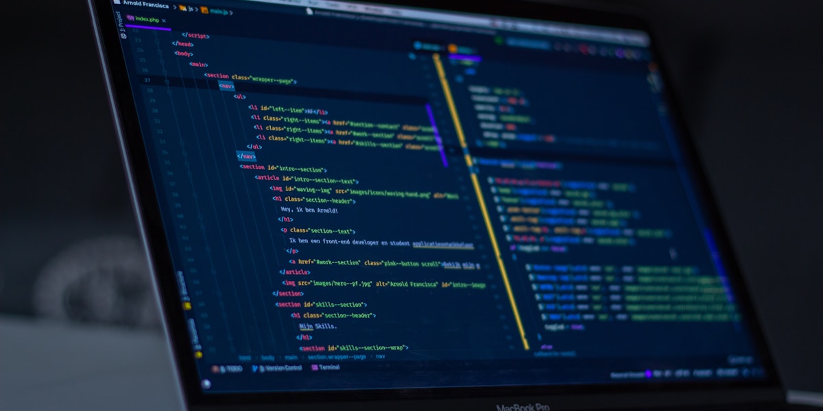 Lines of code glowing on a screen