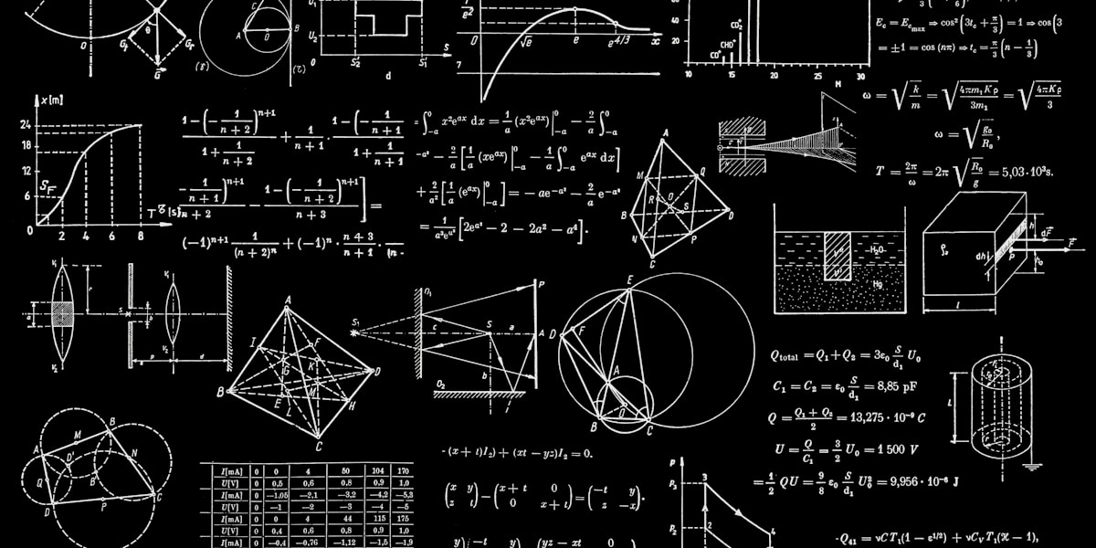 Physics equations written on a board