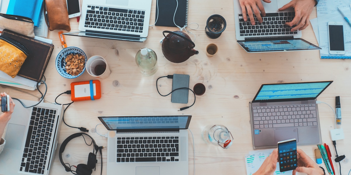 A team of people working together around a table