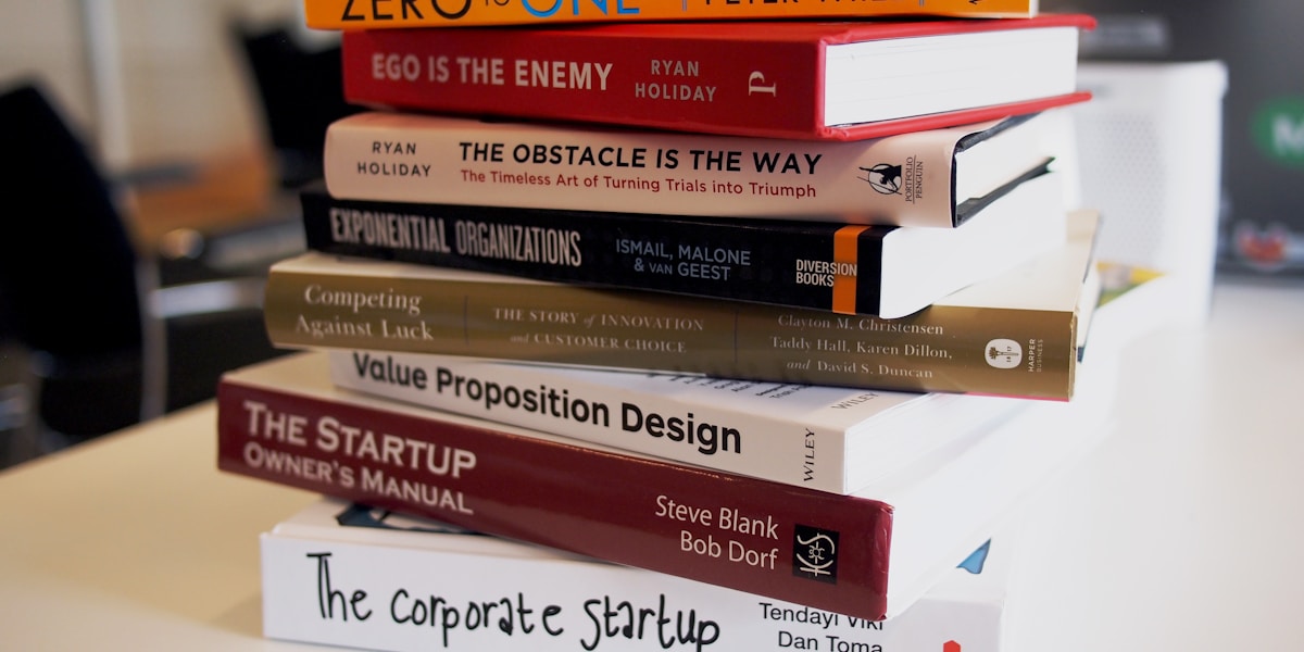 A stack of books on a desk